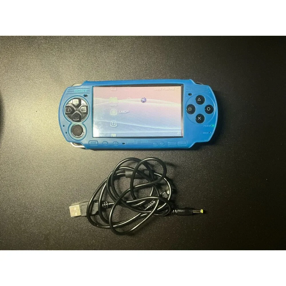 Sony PSP-3001 Bundle w/ New Battery, Sony 1GB Memory Stick, Charger & Game